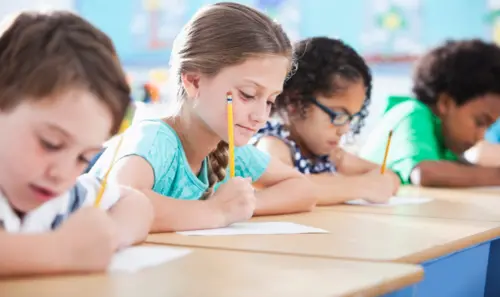 students at writing desks